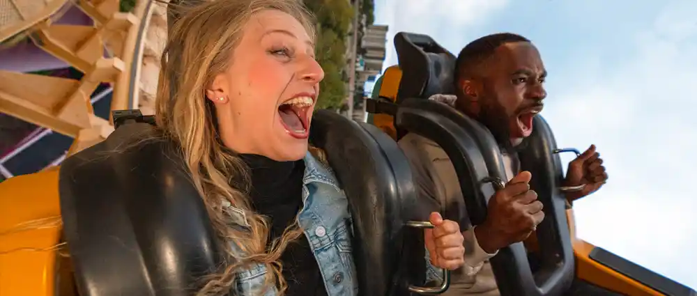 couple-on-roller-coaster Girl floating in a tube on the lazy river